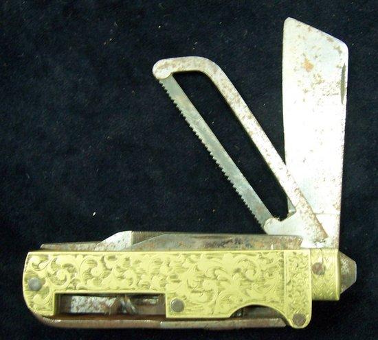 Appraisal: An early th Century combination tool the brass side plates