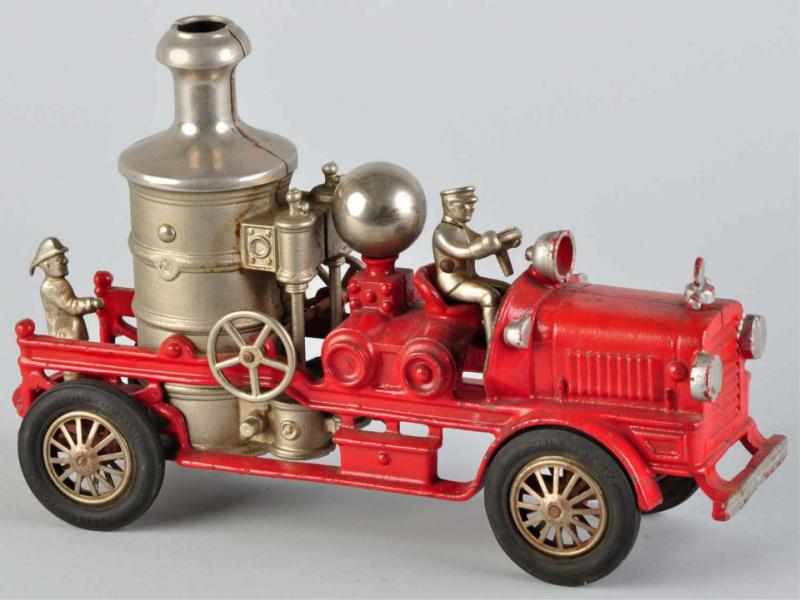 Appraisal: Cast Iron Hubley Fire Pumper Toy Description All original including