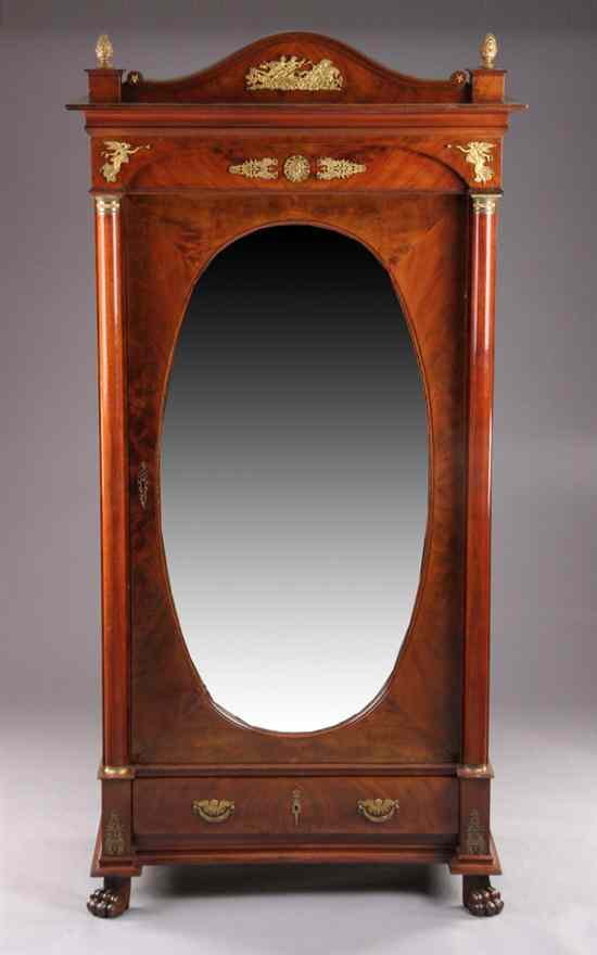 Appraisal: FRENCH EMPIRE GILT-BRONZE MOUNTED MAHOGANY ARMOIRE th century Arching crest