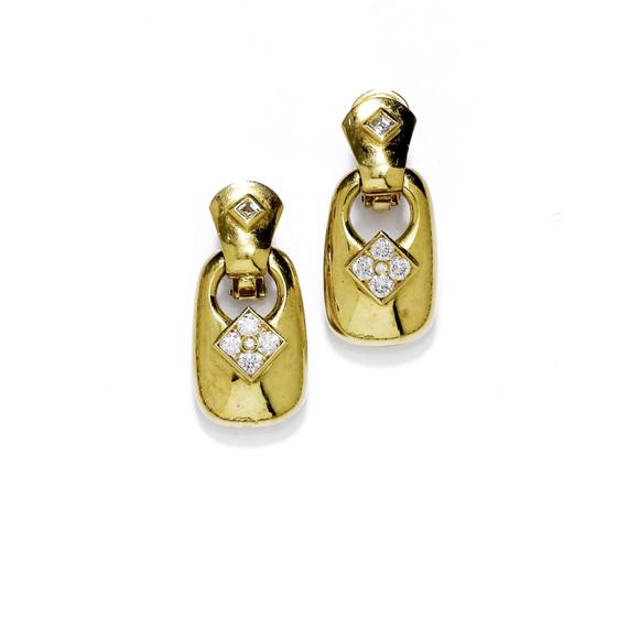 Appraisal: GOLD AND DIAMOND EAR PENDANTS Yellow gold g Casual-elegant ear