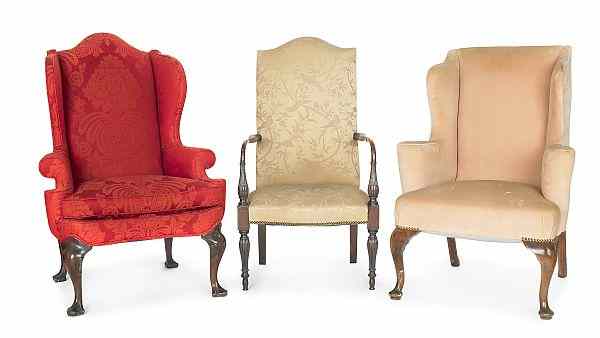 Appraisal: Two George II style mahogany wing chairs together with a