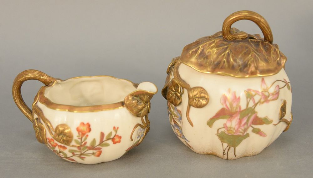 Appraisal: Royal Worcester lotus creamer and covered sugar having gilt decorated