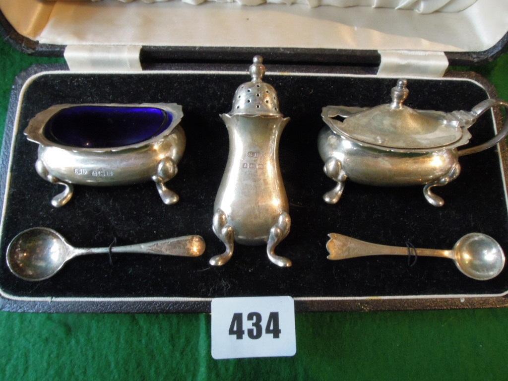 Appraisal: A cased set of silver condiments salt pepper and mustard