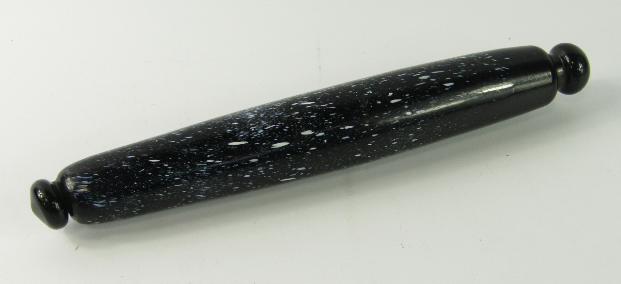 Appraisal: A Victorian black and speckled white glass rolling pin cm