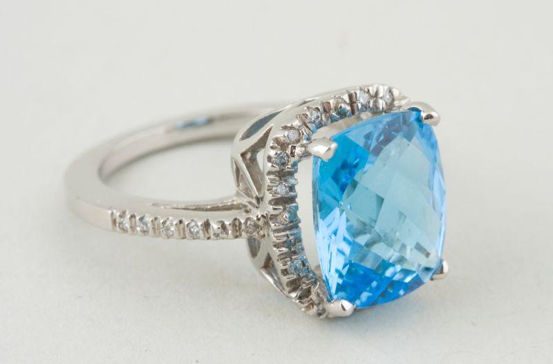 Appraisal: KT White Gold Blue Topaz Ring with checkerboard top cushion