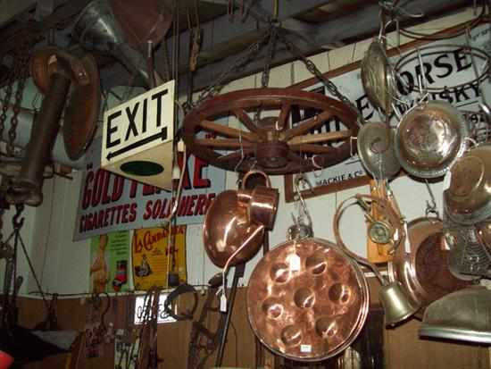 Appraisal: A LARGE COLLECTION OF KITCHENALIA BRASS WARE WAGON WHEELS SIFTER