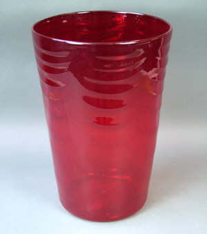 Appraisal: A very large Whitefriars ruby coloured wave ribbed tumbler vase