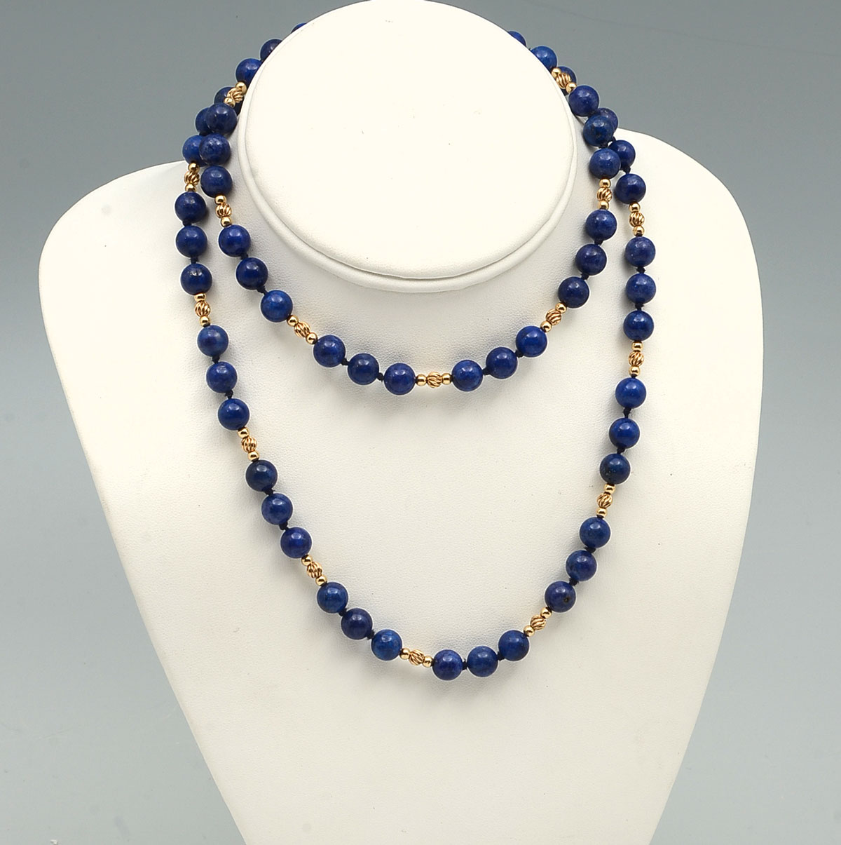 Appraisal: K LAPIS BEADED NECKLACE '' lapis bead necklace alternating with