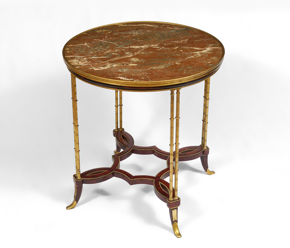 Appraisal: MARBLE TOP CIRCULAR SIDE TABLE Inset marble top with brass