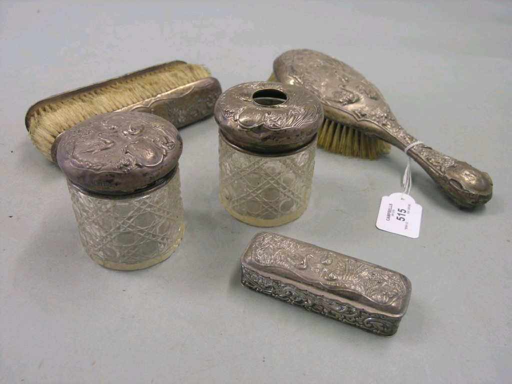 Appraisal: A silver dressing table set consisting of two cut glass