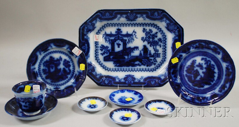 Appraisal: Nine Pieces of English Flow Blue Tableware