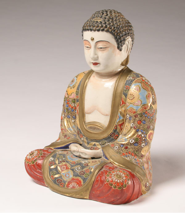 Appraisal: Seated porcelain Buddha with gilt and enamel decoration Rising Sun