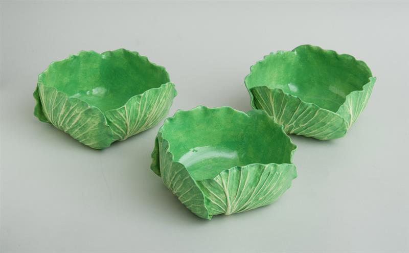 Appraisal: THREE DODIE THAYER GREEN-GLAZED POTTERY CABBAGE LEAF BOWLS Impressed with