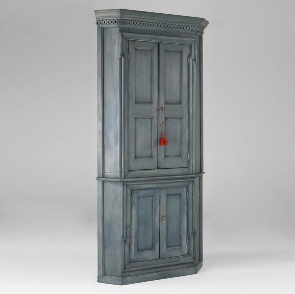 Appraisal: ENGLISH CORNER CUPBOARD Two-piece blue paneled cabinet th C x