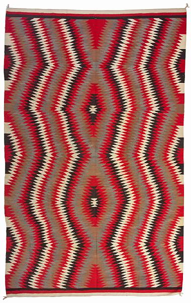 Appraisal: A large Navajo rug With an allover pattern of vertical