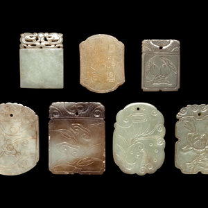 Appraisal: Seven Chinese Celadon Jade Carved Plaques comprising one smoothly polished