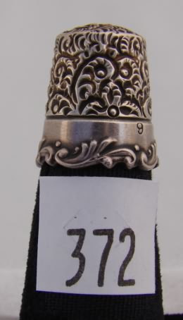 Appraisal: KMD sterling thimble with scalloped rim