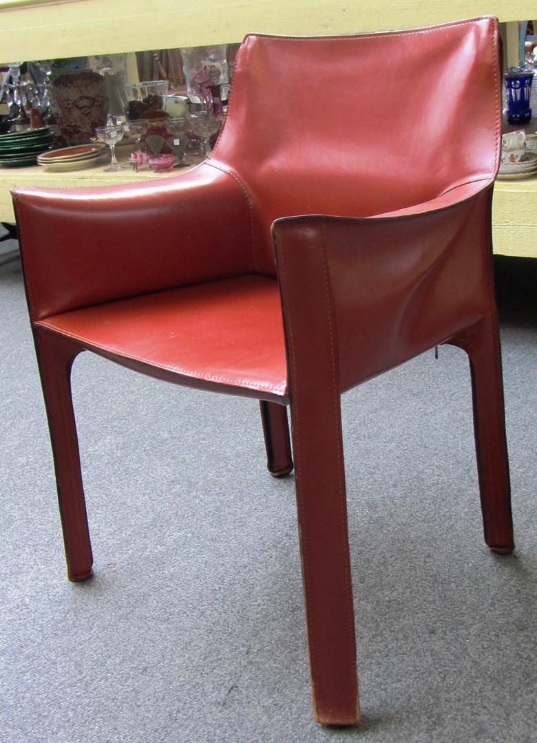 Appraisal: A set of six leather upholstered dining chairs by 'Cassina'