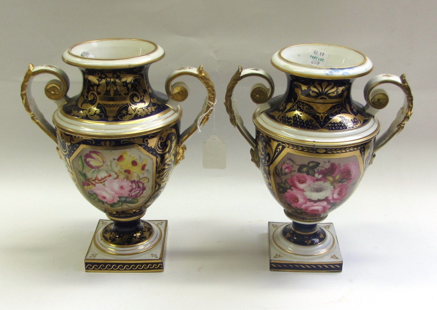 Appraisal: Two Derby blue ground two-handled vases circa - each shield