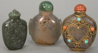 Appraisal: Three hardstone snuff bottles jade master snuff spinach jade small