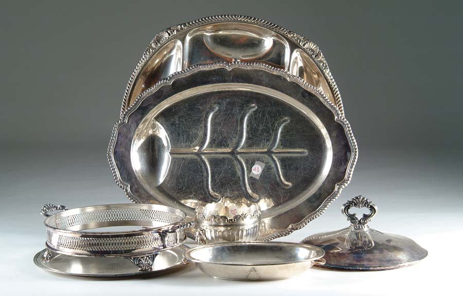 Appraisal: SEVEN PIECES OF SILVER PLATED TABLEWARE round well and tree