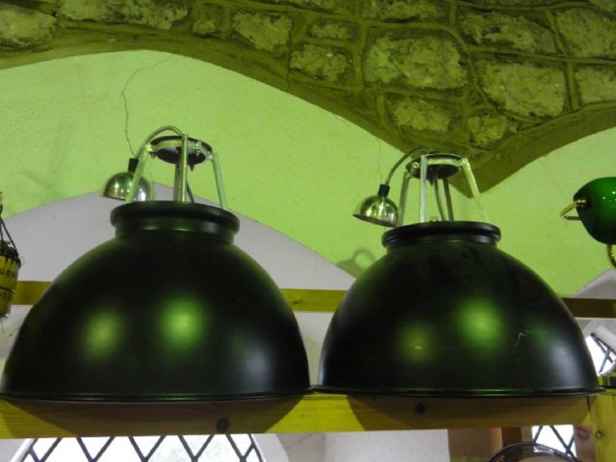 Appraisal: A pair of contemporary ceiling lights in the industrial manner