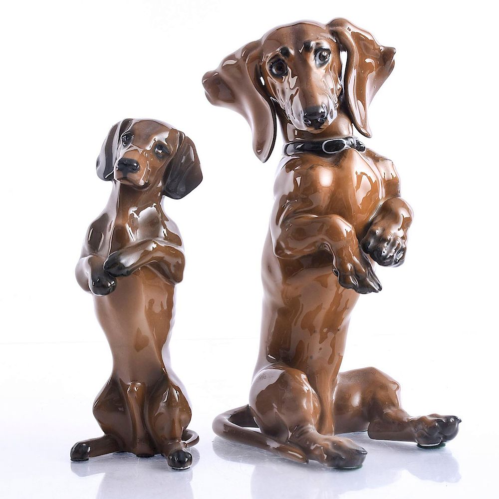 Appraisal: PAIR OF ROSENTHAL CERAMIC DOG FIGURINES Impressed Signed Karner and