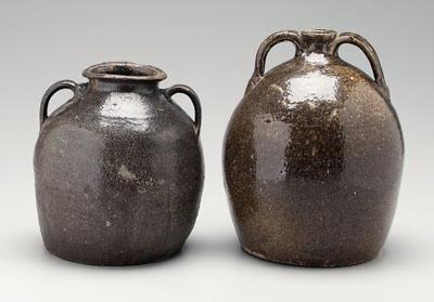 Appraisal: Two stoneware jugs both with two handles one ovoid with