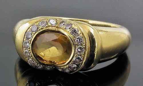 Appraisal: A modern ct gold mounted sapphire and diamond dress ring