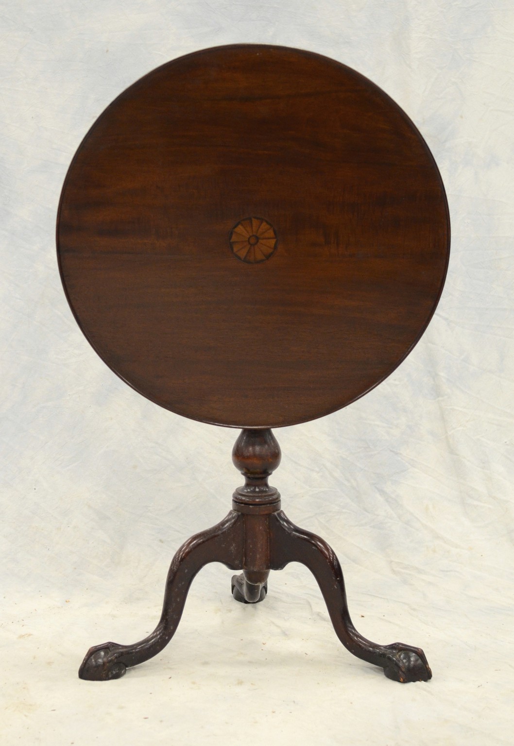 Appraisal: Inlaid mahogany round tilt top table dish top ball and