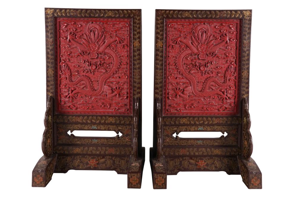 Appraisal: PAIR OF CHINESE LACQUERED SCREENS ON STANDSeach inset with a