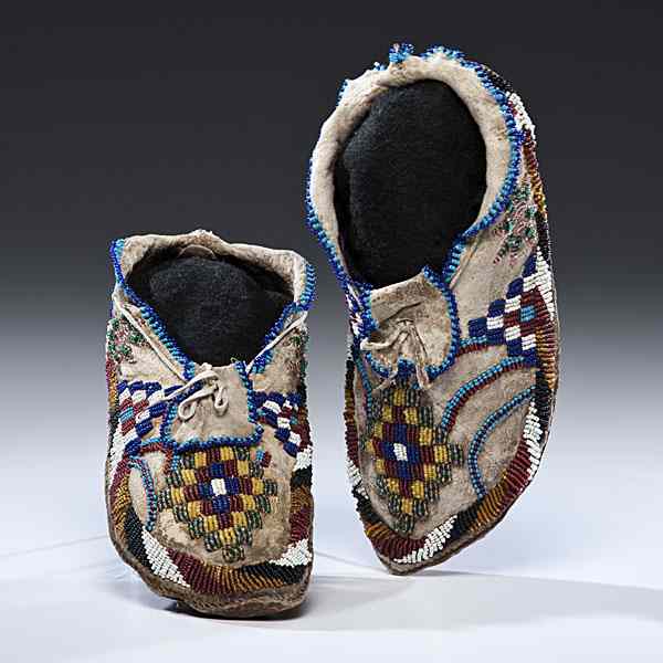 Appraisal: Apache Beaded Hide Moccasins thread-sewn and beaded using a wide