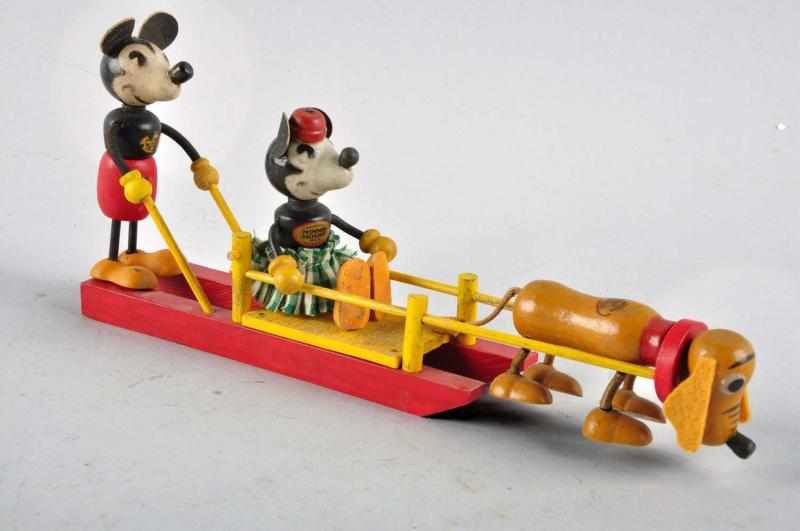 Appraisal: Disney Fun-E-Flex Mickey Minnie Sled Toy Description All wood with