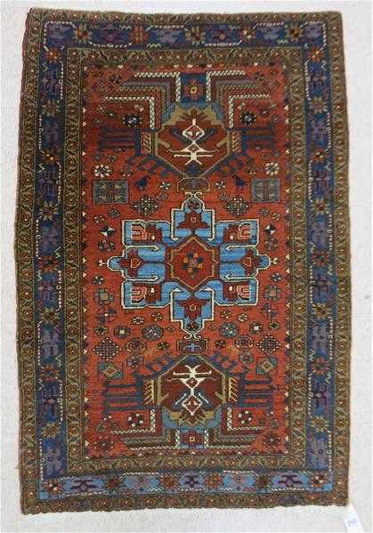 Appraisal: SEMI-ANTIQUE PERSIAN TRIBAL AREA RUG triple geometric medallion design on