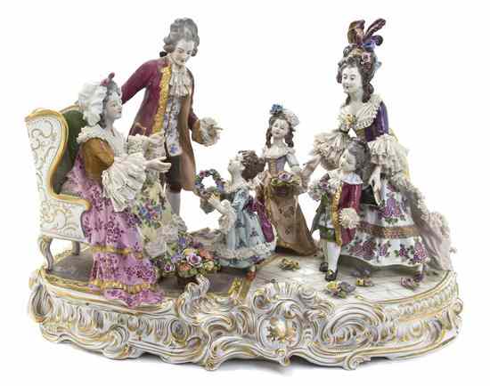 Appraisal: A Dresden Porcelain Figural Group depicting three adults and three