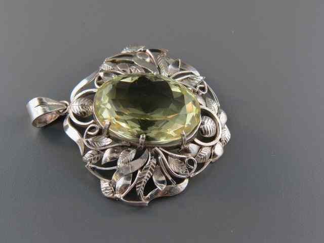 Appraisal: Lemon Quartz Pendant carat oval gem in fancy sterling silver