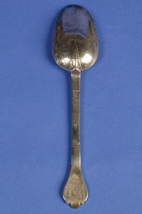 Appraisal: A PAIR OF WILLIAM AND MARY LACE BACK TREFID SPOONS