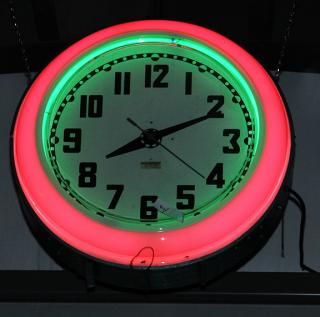 Appraisal: Neon double -ring clock red and green neon working fine