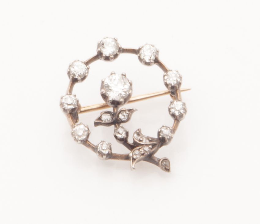 Appraisal: An Edwardian diamond set brooch of open circular form set