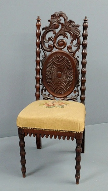 Appraisal: Victorian carved walnut side chair with a needlepoint seat h