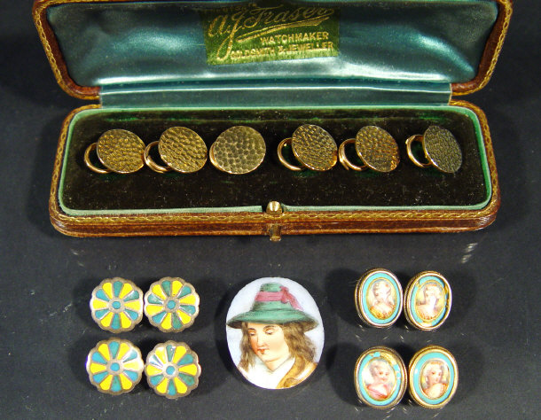 Appraisal: Hand painted ceramic buttons with ladies heads and a boxed