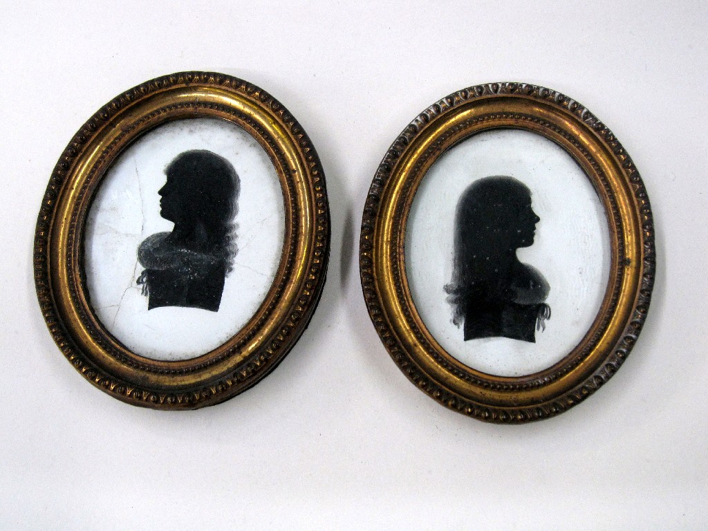 Appraisal: Pair of framed silhouette portraits