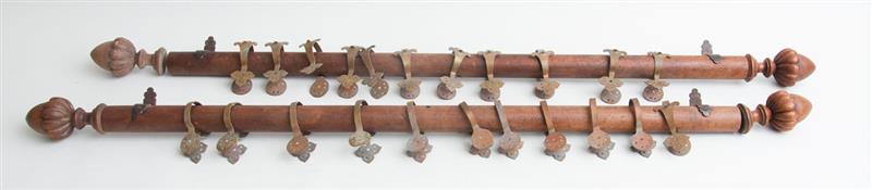 Appraisal: PAIR OF WOOD CURTAIN RODS WITH COPPER RINGS x in