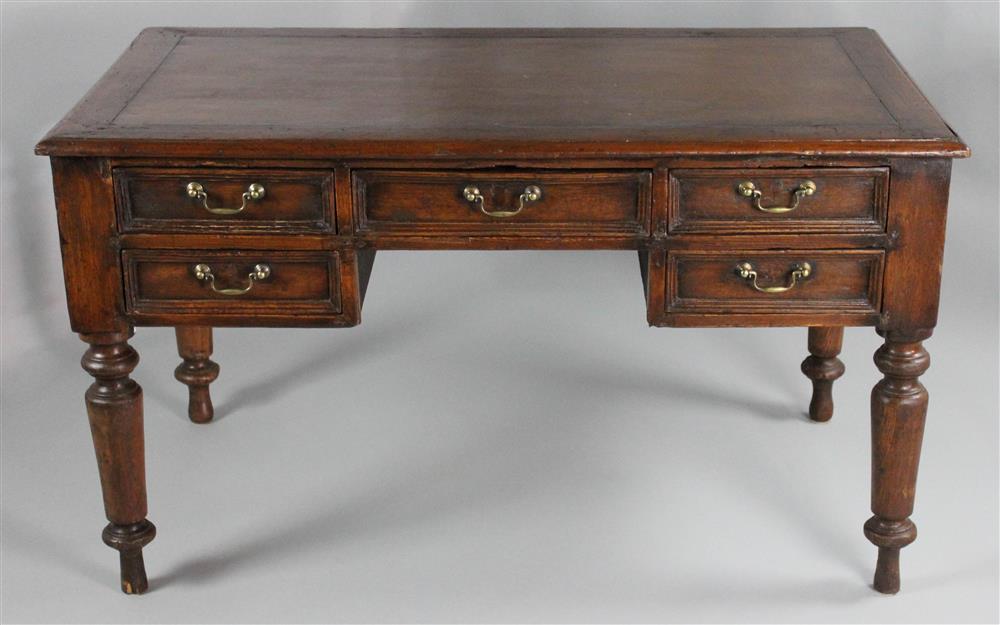 Appraisal: STAINED PINE KNEEHOLE DESK the rectangular top with molded edge