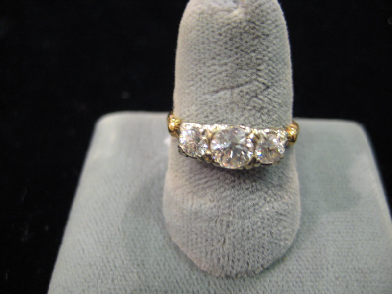 Appraisal: DIAMOND RING k yellow gold original three stone lady's ring