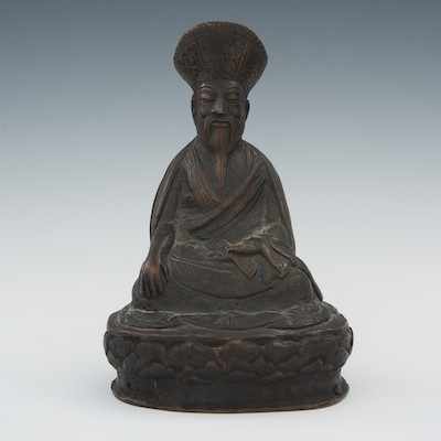 Appraisal: A Hollow Cast Bronze Figure of a Seated Mandarin Hollow