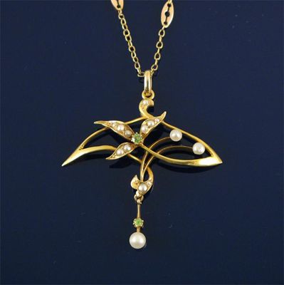 Appraisal: An Art Nouveau gold pendant set with seed pearls and