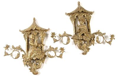 Appraisal: A pair of chinoiserie giltwood and lacquer twin branch wall