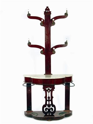 Appraisal: A Victorian mahogany hall stand with brass and ceramic hooks