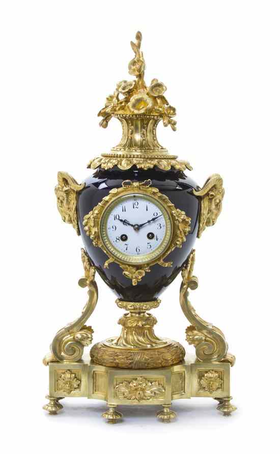 Appraisal: A Sevres Style Porcelain and Gilt Bronze Mounted Mantel Clock